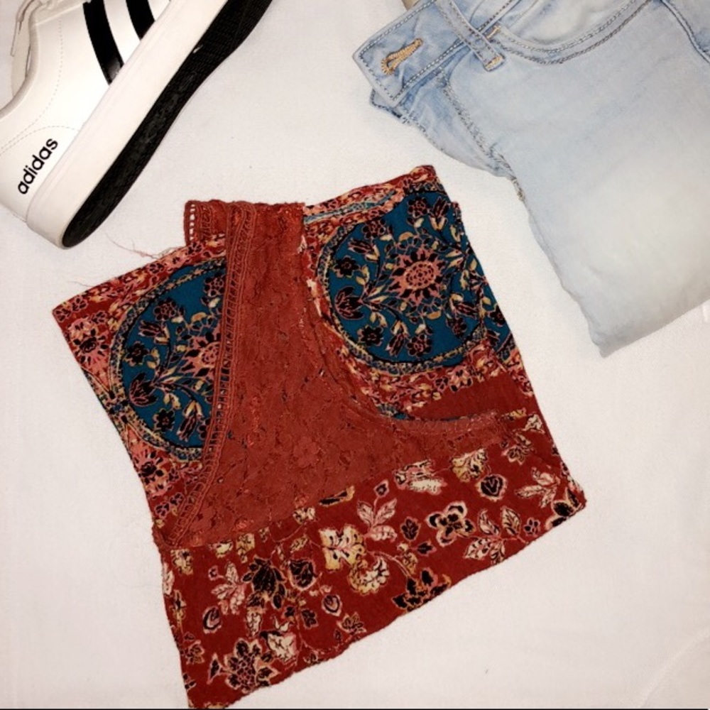A floral printed bohemian style v neck tank top